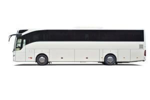 White coach bus isolated on white background with a drop shadow.