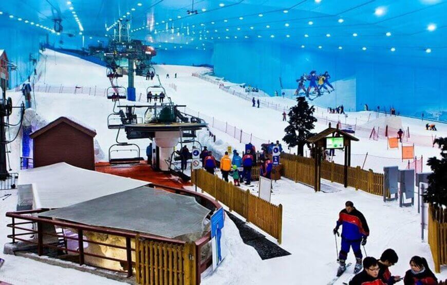 Family having fun on the ski slopes and snow park at Ski Dubai
