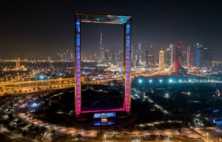 The Dubai Frame, a towering landmark showcasing the contrast between old and modern Dubai.