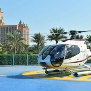 View of Dubai's skyline from a helicopter during our 12-minute tour, flying over the Burj Khalifa, Palm Jumeirah, and other iconic landmarks through booking our helicopter ride dubai