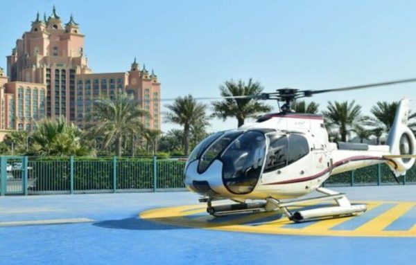 View of Dubai's skyline from a helicopter during our 12-minute tour, flying over the Burj Khalifa, Palm Jumeirah, and other iconic landmarks through booking our helicopter ride dubai