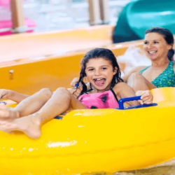 Family having fun on water slide at Wild Wadi Water Park