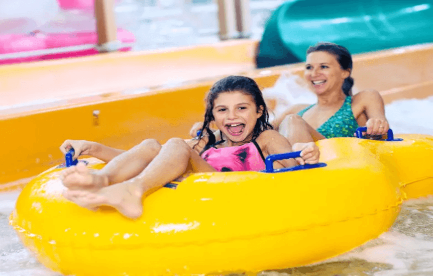Family having fun on water slide at Wild Wadi Water Park