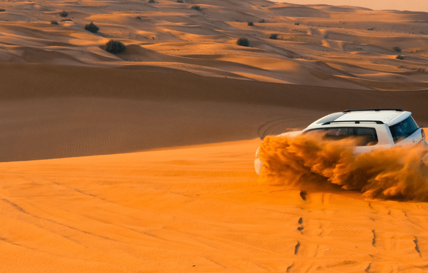 Image of a luxury 4x4 vehicle in the desert during a private morning safari in Dubai.