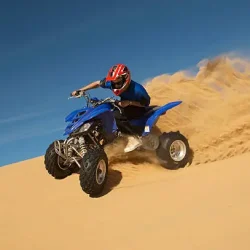 Morning desert safari with atv quad bike